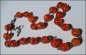 Preview: Collier aus orangen Crackle-Perlen