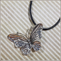 Preview: "Schmetterling" an schwarzem Lederband - 51 cm, plus Verlängerung