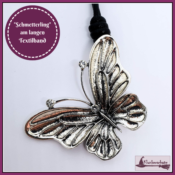 "Schmetterling" am langen Textilband